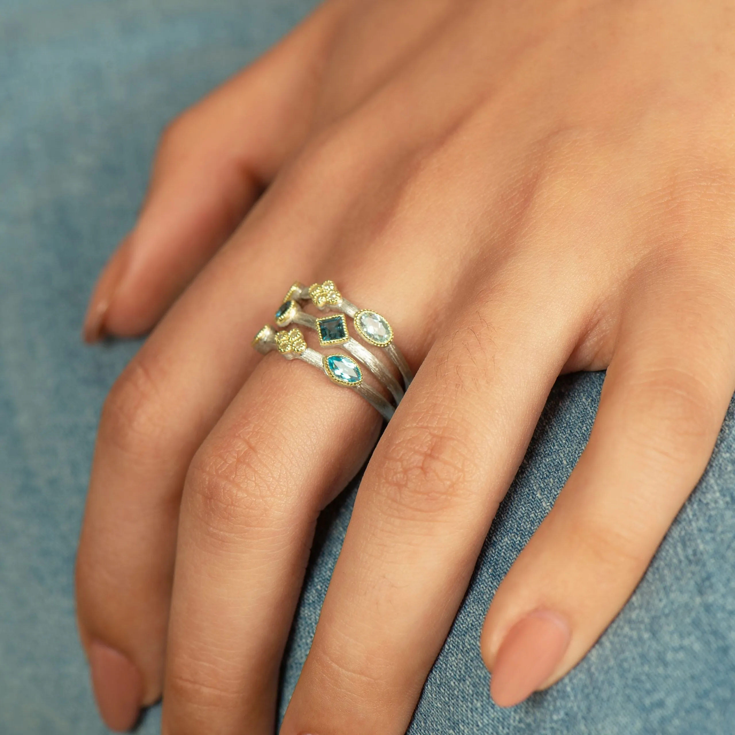 Mixed Metal Three Row Ring with Alternating White Diamonds and Blue Topaz