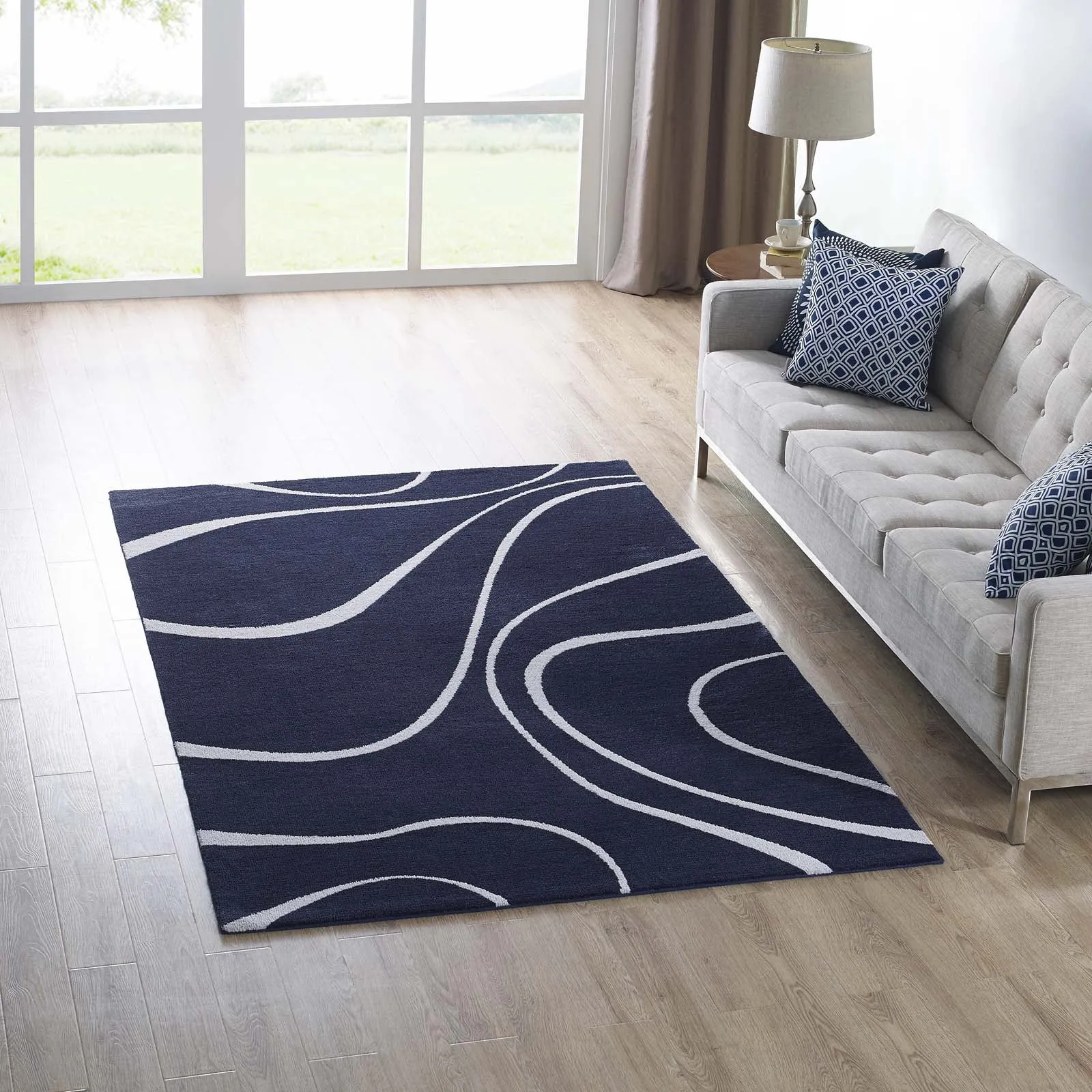 Therese Abstract Swirl 5x8 Area Rug Navy and Ivory